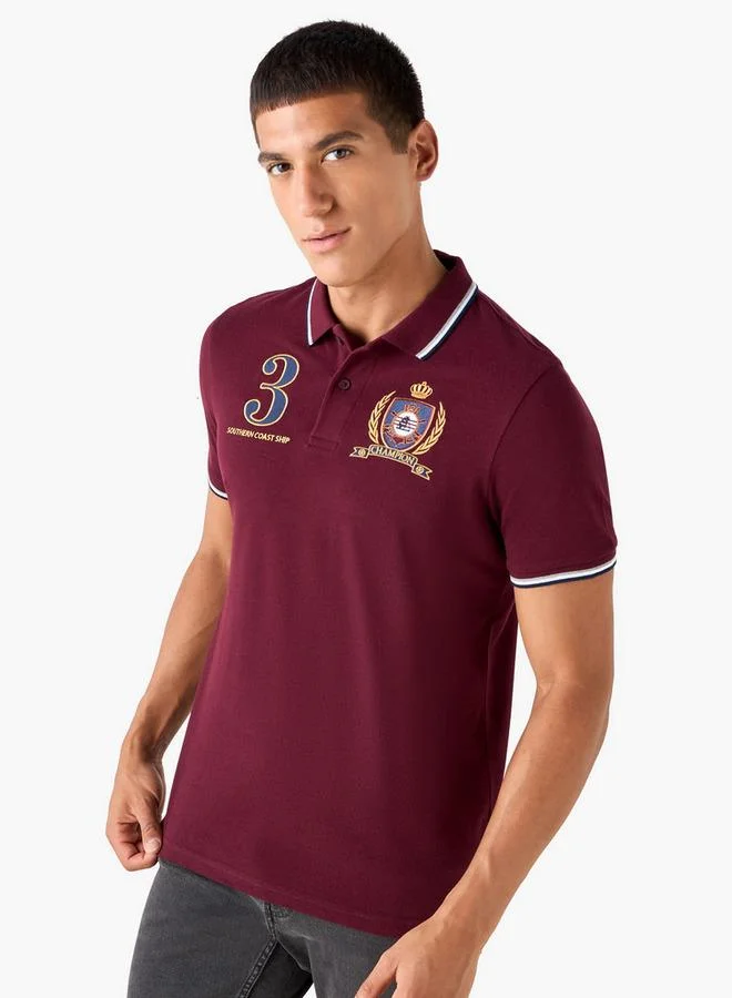 سبلاش فيڤ تيشيرت بولو مطرز بشعار